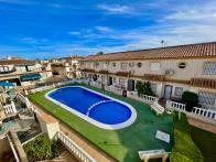 Sunny South-Facing 2-Bed Bungalow with Roof Terrace & Pool Views